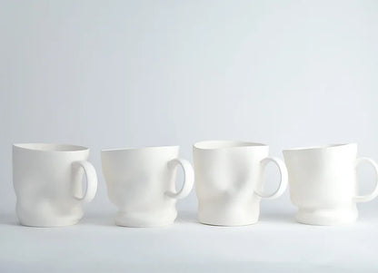 Deformovaný porcelánový hrnek SGW Lab